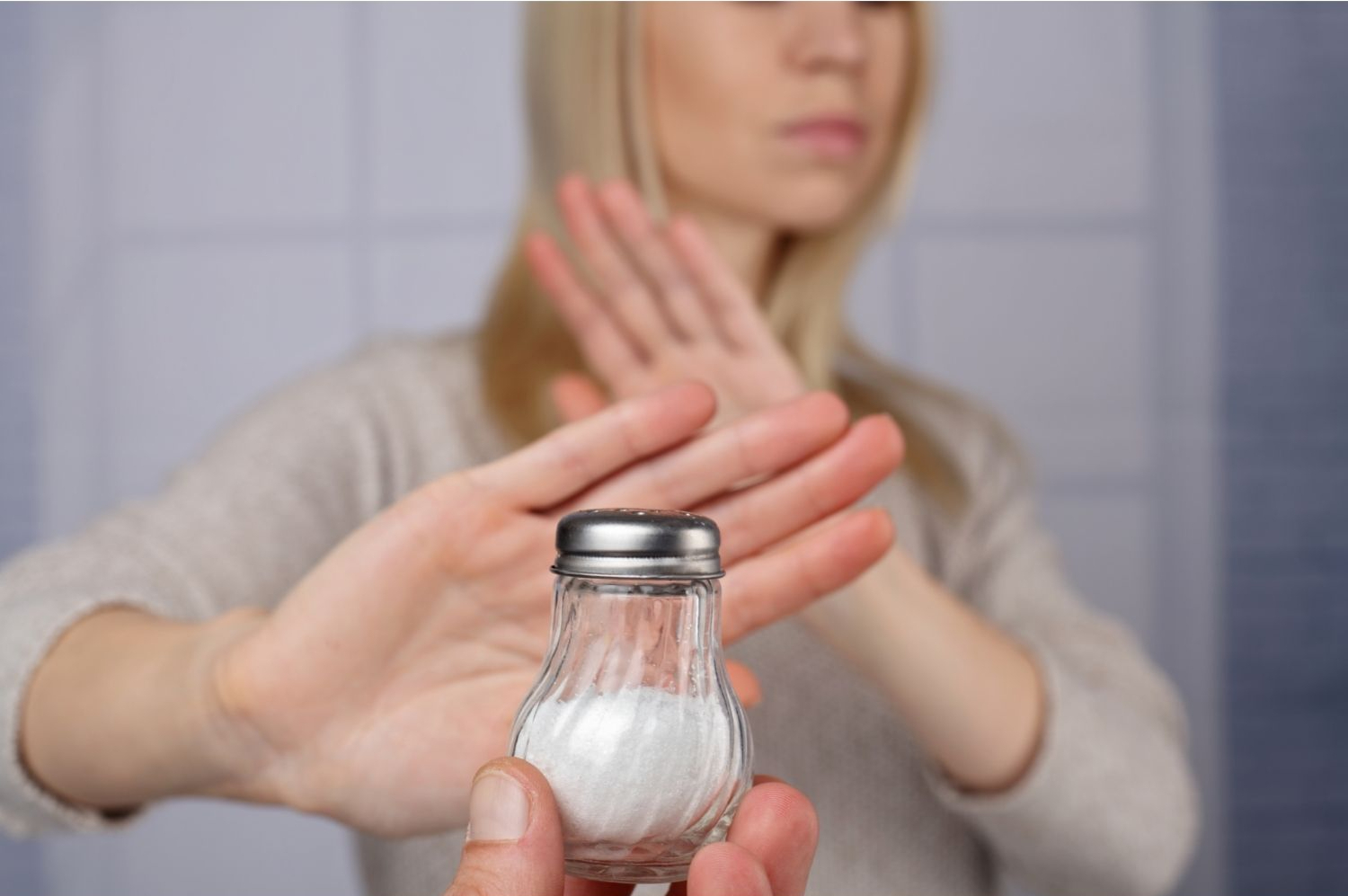 A person refusing salt. Health care concept, hypertension prevention